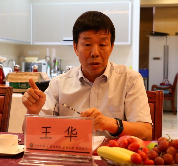 5817ee9055441.jpg 王华.jpg